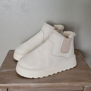Cream faux fur lined slip on boots